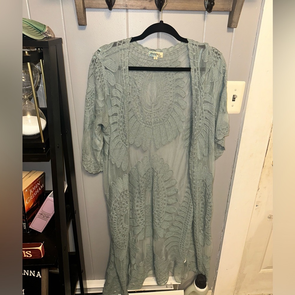 Open front cardigan style cover